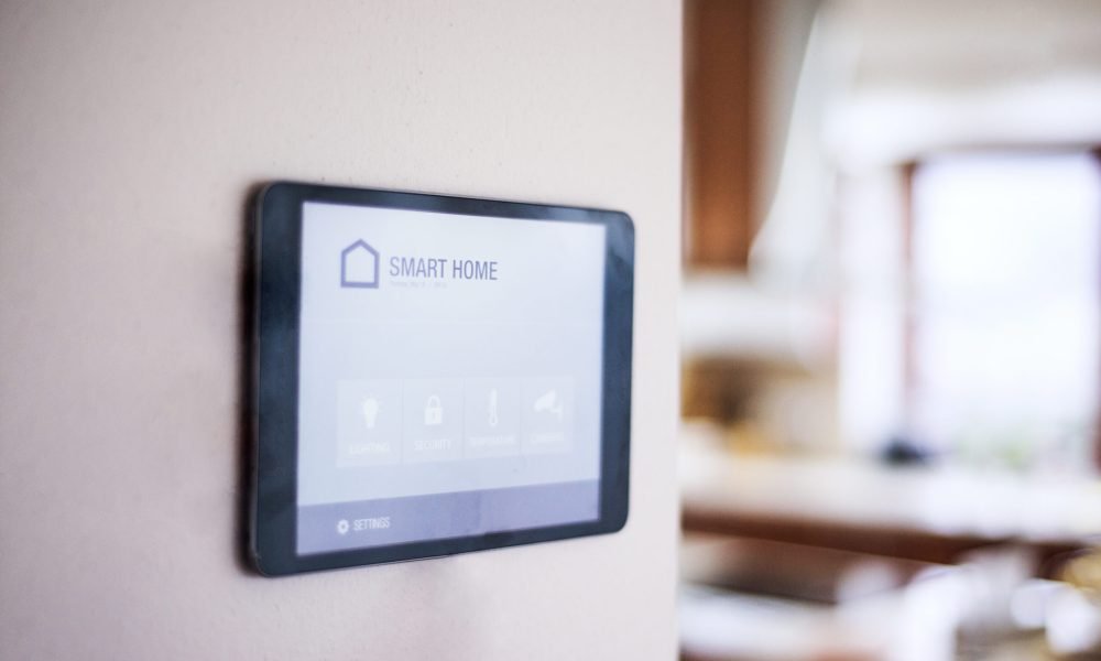 A tablet with smart home control system.